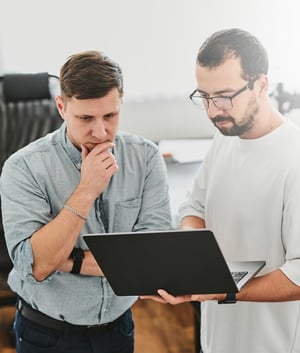 programmers working behind computer